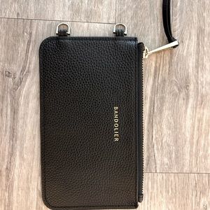 Bandolier Pouch in mint condition. Attaches to the straps. Black w/gold trim.